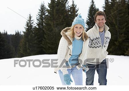 Young Couple In Alpine Snow Scene View Large Photo Image Stock Photography - Young Couple In Alpine Snow Scene. Fotosearch