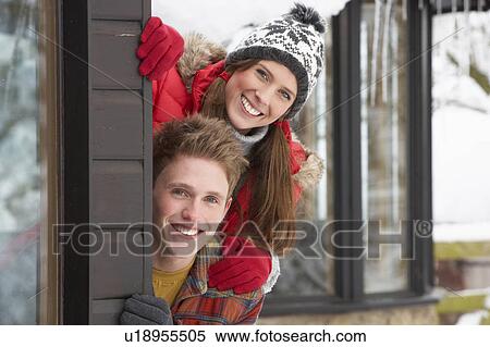 Stock Photography - Young couple in snow. Fotosearch