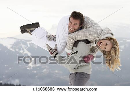 Young Couple On Winter Vacation View Large Photo Image Stock Image - Young Couple On Winter Vacation. Fotosearch