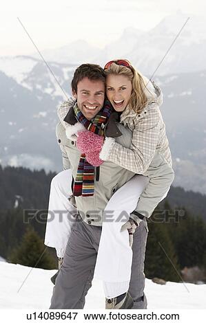 Young Couple On Winter Vacation View Large Photo Image Stock Photo - Young Couple On Winter Vacation. Fotosearch