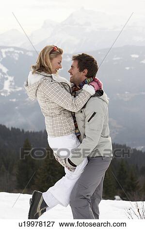 Young Couple On Winter Vacation View Large Photo Image Stock Photo - Young Couple On Winter Vacation. Fotosearch
