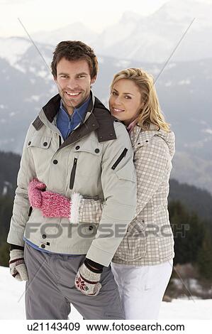 Stock Photo - Young Couple On Winter Vacation. Fotosearch