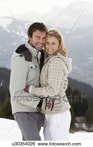 Stock Photograph - Young Couple On Winter Vacation. Fotosearch