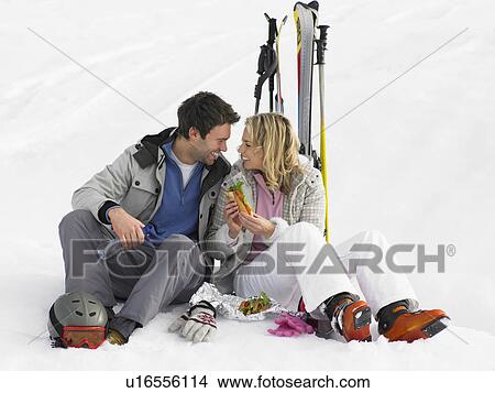 Young Couple With Picnic On Ski Vacation View Large Photo Image Picture - Young Couple With Picnic On Ski Vacation. Fotosearch