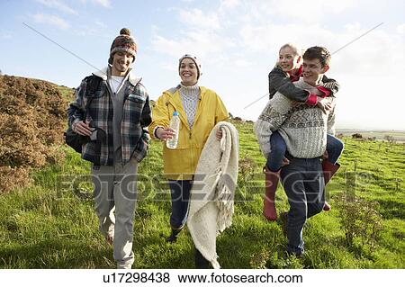 Stock Photo - Young couples on country walk. Fotosearch