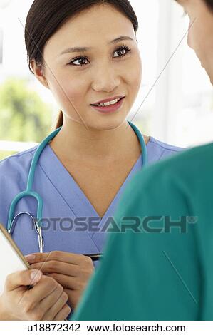 Stock Image - Young doctors. Fotosearch
