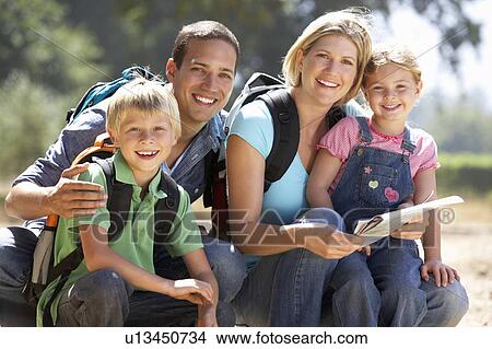 Picture - Young family on country walk. Fotosearch