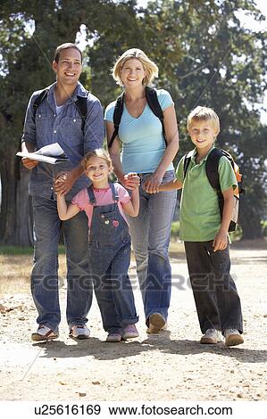 Stock Photo - Young family on country walk. Fotosearch
