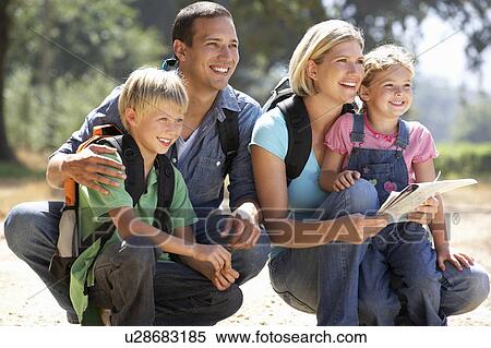 Young family on country walk View Large Photo Image Stock Photography - Young family on country walk. Fotosearch