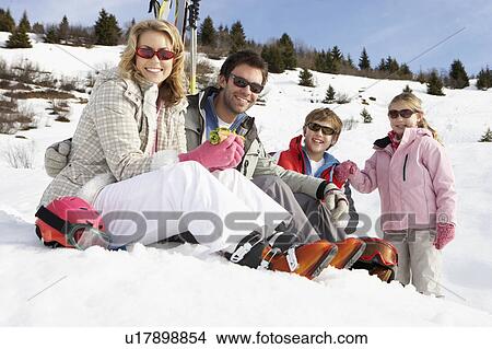 Young Family On Ski Vacation View Large Photo Image Picture - Young Family On Ski Vacation. Fotosearch