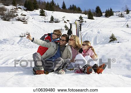 Young Family On Ski Vacation View Large Photo Image Stock Image - Young Family On Ski Vacation. Fotosearch