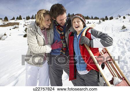 Picture - Young Family On Winter Vacation. Fotosearch