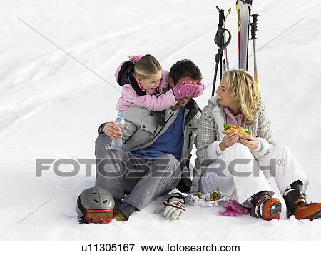Young Family With Picnic On Ski Vacation View Large Photo Image Stock Photo - Young Family With Picnic On Ski Vacation. Fotosearch