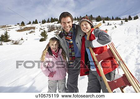 Young Father And Children In Snow With Sled View Large Photo Image Stock Photo - Young Father And Children In Snow With Sled. Fotosearch
