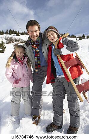 Young Father And Children In Snow With Sled View Large Photo Image Stock Photograph - Young Father And Children In Snow With Sled. Fotosearch