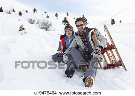 Young Father And Son In Snow With Sled View Large Photo Image Picture - Young Father And Son In Snow With Sled. Fotosearch
