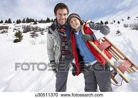 Young Father And Son In Snow With Sled View Large Photo Image Stock Image - Young Father And Son In Snow With Sled. Fotosearch