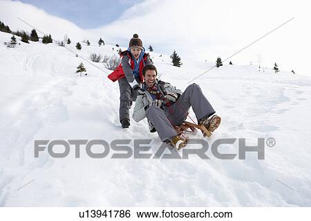 Young Father And Son Sledding View Large Photo Image Stock Photograph - Young Father And Son Sledding. Fotosearch