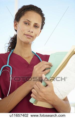 Stock Image - Young female doctor. Fotosearch