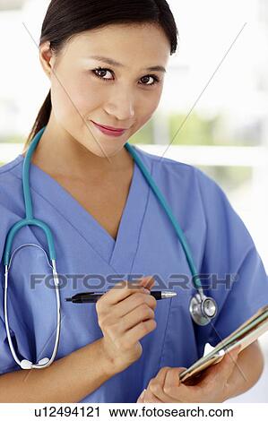 Stock Image - Young female doctor. Fotosearch