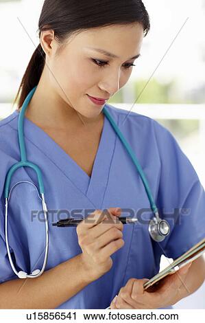 Stock Image - Young female doctor. Fotosearch