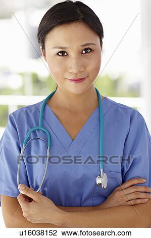 Stock Image - Young female doctor. Fotosearch