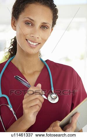 Stock Photo - Young female doctor. Fotosearch