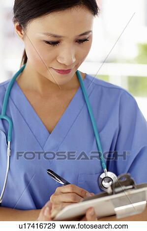 Stock Photo - Young female doctor. Fotosearch