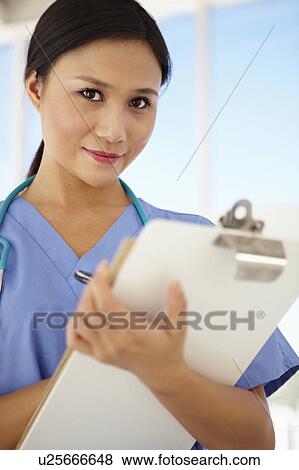 Young female doctor View Large Photo Image Stock Photo - Young female doctor. Fotosearch