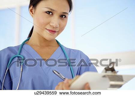 Young female doctor View Large Photo Image Stock Photo - Young female doctor. Fotosearch