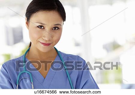 Stock Photograph - Young female doctor. Fotosearch