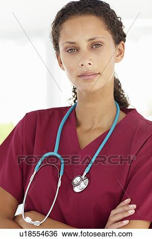 Stock Photograph - Young female doctor. Fotosearch