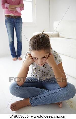 Stock Photography - Young girl in trouble with mother. Fotosearch