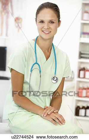 Picture - Young hospital doctor. Fotosearch