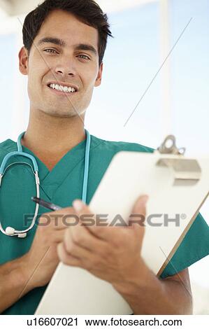 Young male doctor View Large Photo Image Stock Image - Young male doctor. Fotosearch