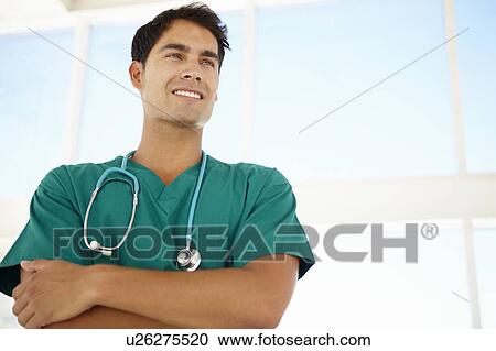 Stock Image - Young male doctor. Fotosearch