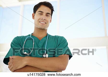 Stock Photo - Young male doctor. Fotosearch