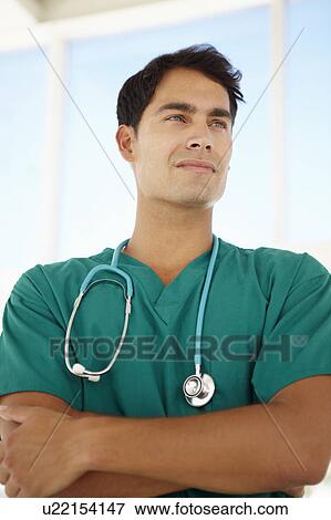 Stock Photo - Young male doctor. Fotosearch