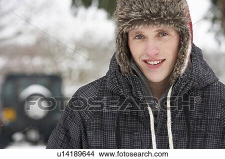 Young man in snow View Large Photo Image Picture - Young man in snow. Fotosearch