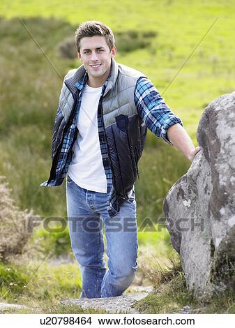 Young man in the country View Large Photo Image Picture - Young man in the country. Fotosearch