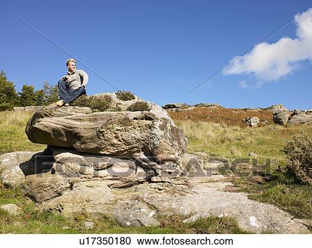 Stock Image - Young man in the country. Fotosearch