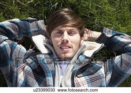 Stock Image - Young man in the country. Fotosearch