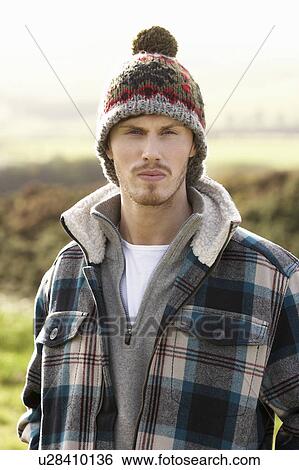 Stock Photograph - Young man in the country. Fotosearch