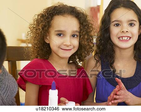 Young mixed race children doing handicrafts View Large Photo Image Stock Photograph - Young mixed race children doing handicrafts. Fotosearch