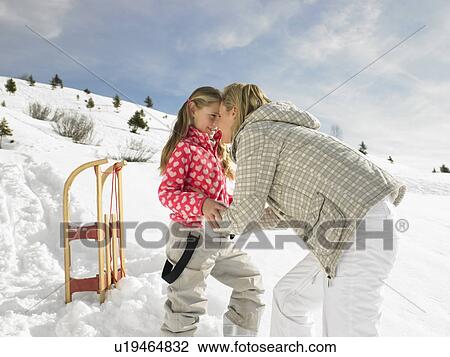 Young Mother And Daughter On Winter Vacation View Large Photo Image Stock Image - Young Mother And Daughter On Winter Vacation. Fotosearch
