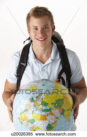 Young traveller with globe View Large Photo Image Stock Photography - Young traveller with globe. Fotosearch