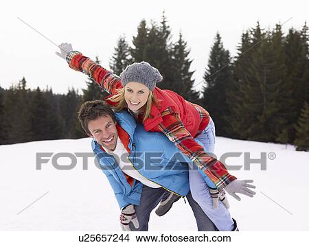 Picture - Young Woman In Alpine Snow Scene. Fotosearch
