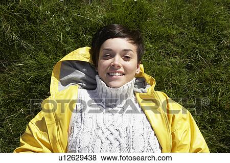 Young woman in the country View Large Photo Image Stock Photo - Young woman in the country. Fotosearch
