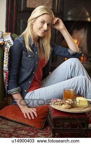 Young woman making toast on open fire View Large Photo Image Stock Image - Young woman making toast on open fire. Fotosearch