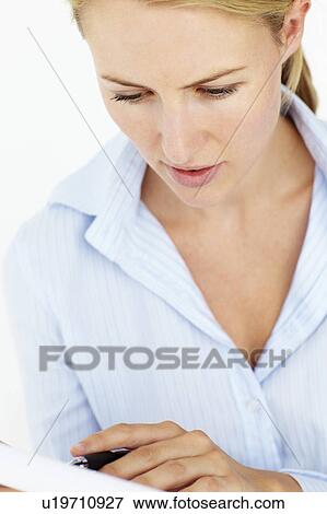 Young woman writing reading View Large Photo Image Stock Photo - Young woman writing reading. Fotosearch